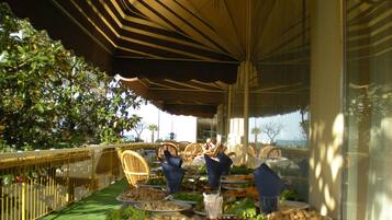 Breakfast, lunch, dinner served; local cuisine