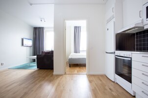 Standard Apartment, 1 Bedroom | Living area | Flat-screen TV