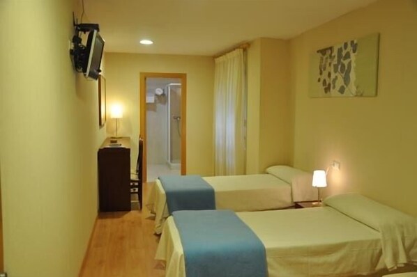 Habitacions insonoritzades, llits addicionals i wifi gratuïta 