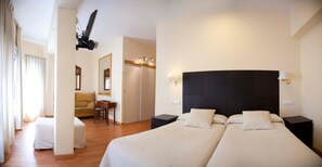 Habitacions insonoritzades, llits addicionals i wifi gratuïta 