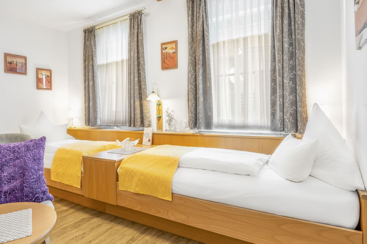 twin room | minibar, in-room safe, desk, cots/infant beds