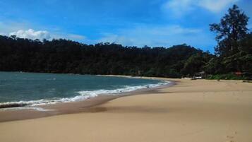 Enjoy a serene beach experience with fine sand and calm waters.