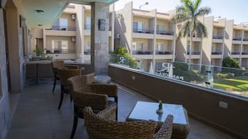 Breakfast, lunch served; local and international cuisine, pool views