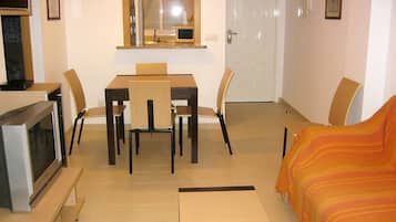Apartment, 2 Bedrooms, Beachside (4 pax) | Living room | TV