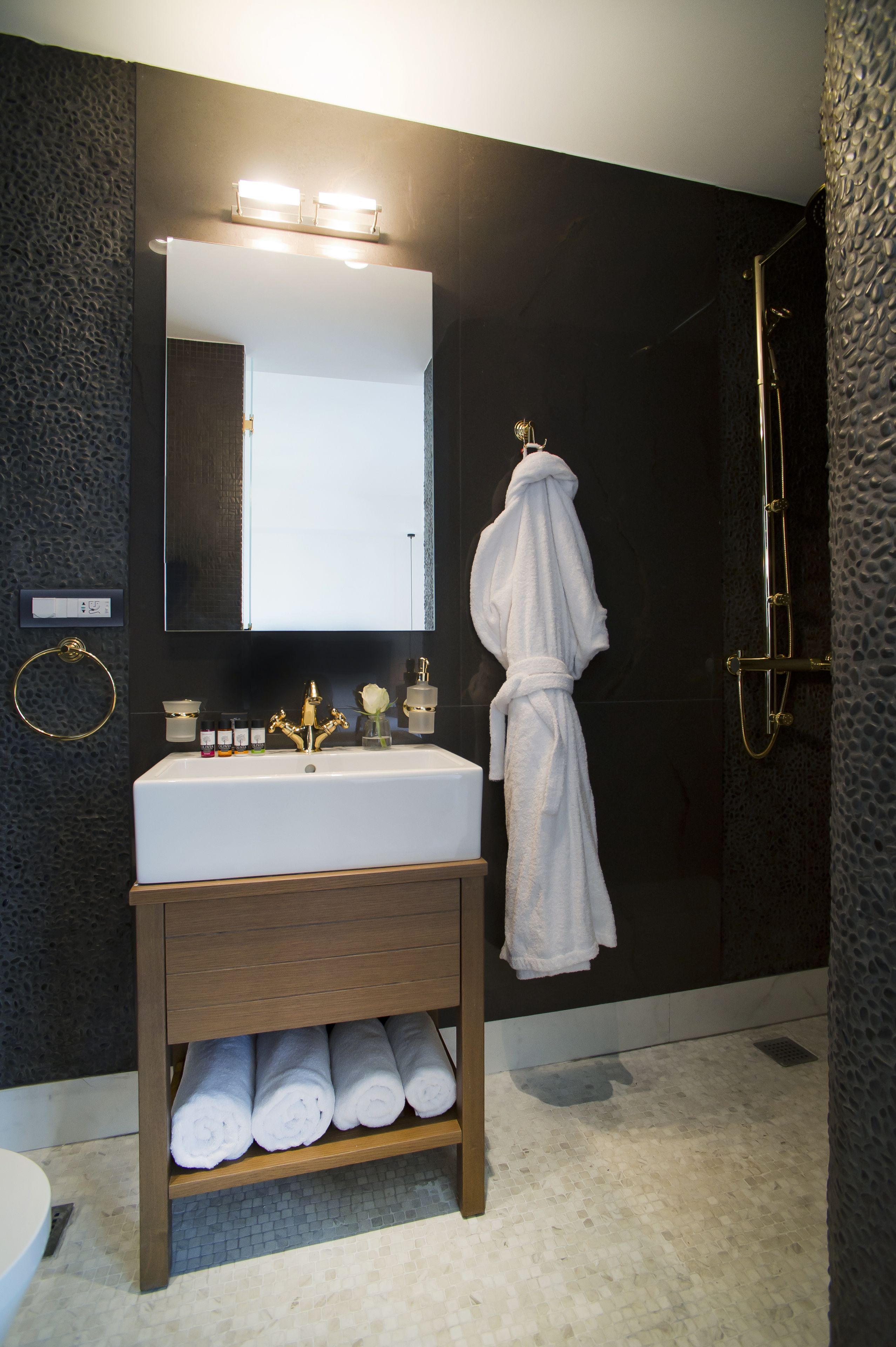 acropolis panorama loft | bathroom | shower, rainfall showerhead, designer toiletries, hair dryer
