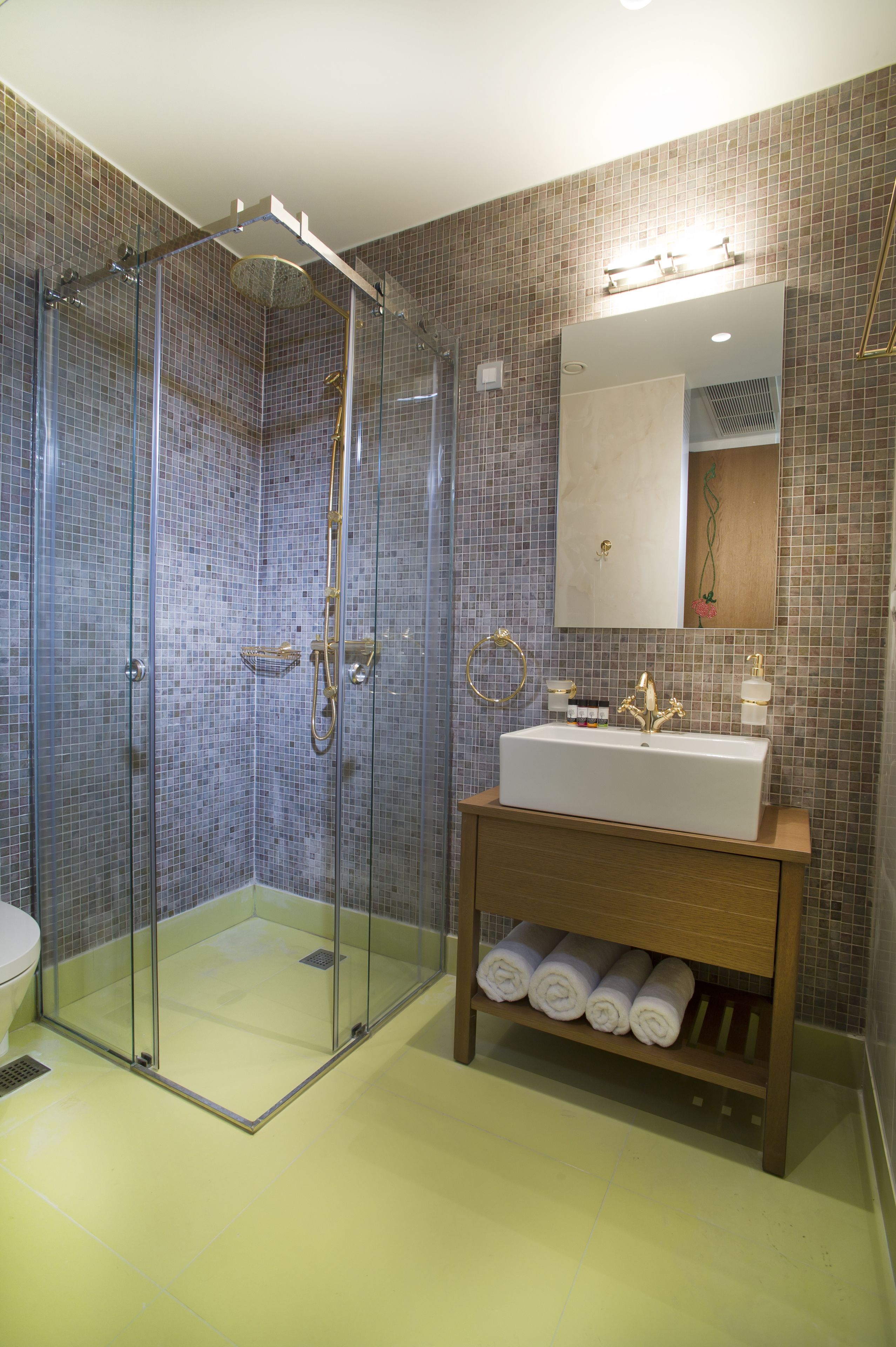 shower, rainfall showerhead, designer toiletries, hair dryer