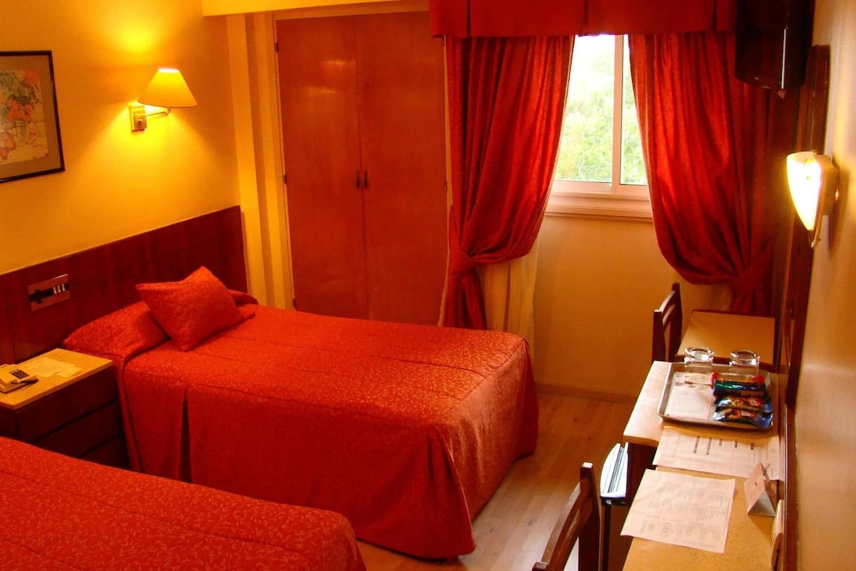 Ropa de cama de alta calidad y minibar