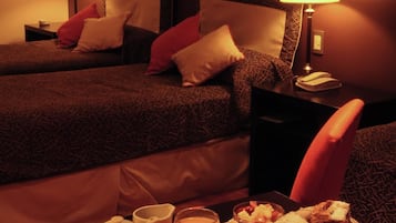 Ropa de cama de alta calidad y minibar