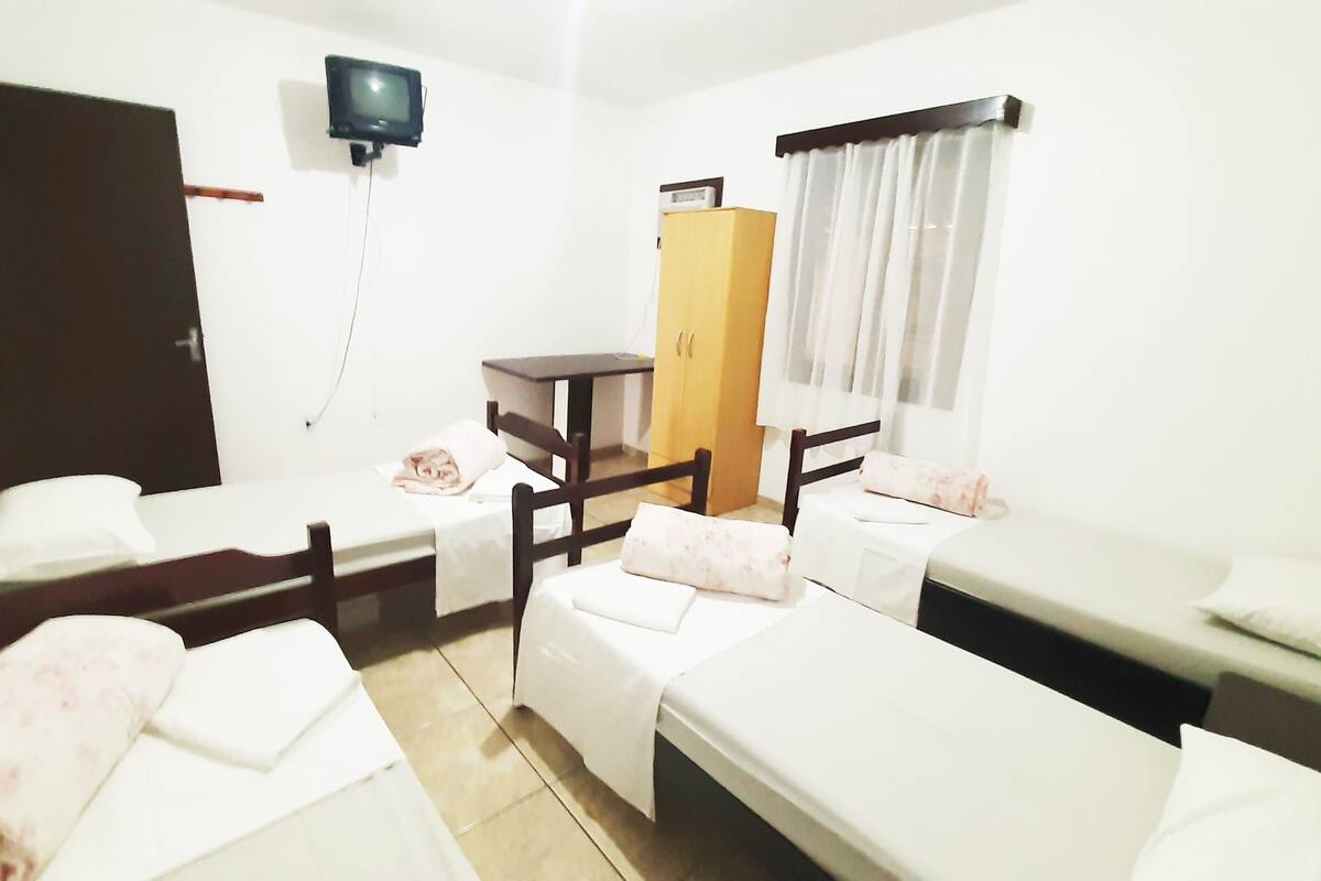 Family Room | Minibar, WiFi (free), bed sheets