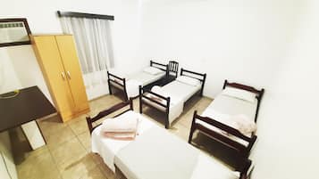 Quarto família | Frigobar, Wi-Fi de cortesia, roupa de cama