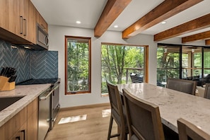 Deluxe Condo, 2 Bedrooms, Balcony, River View (CEC 11) | Private kitchen | Fridge, microwave, oven, stovetop - Chateau Eau Claire & Roaring Fork by Frias Properties (Aspen)