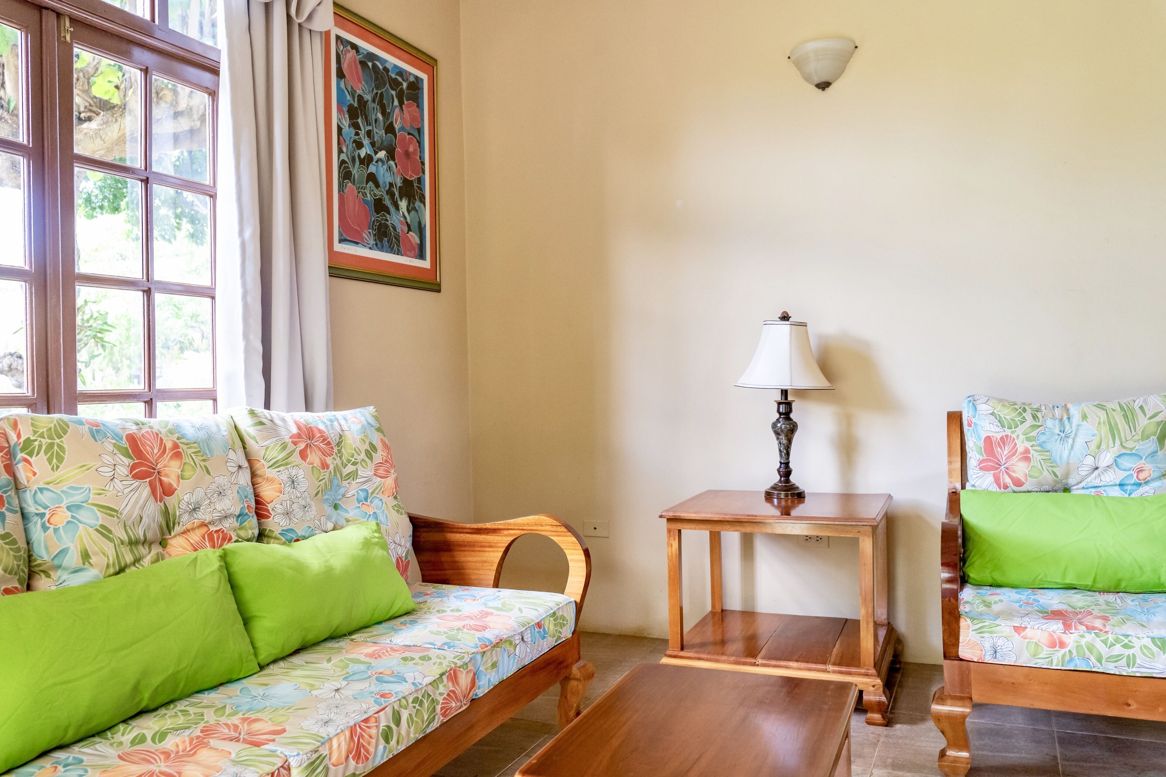 suite, garden view | living area | 40-inch flat-screen tv with digital channels, tv