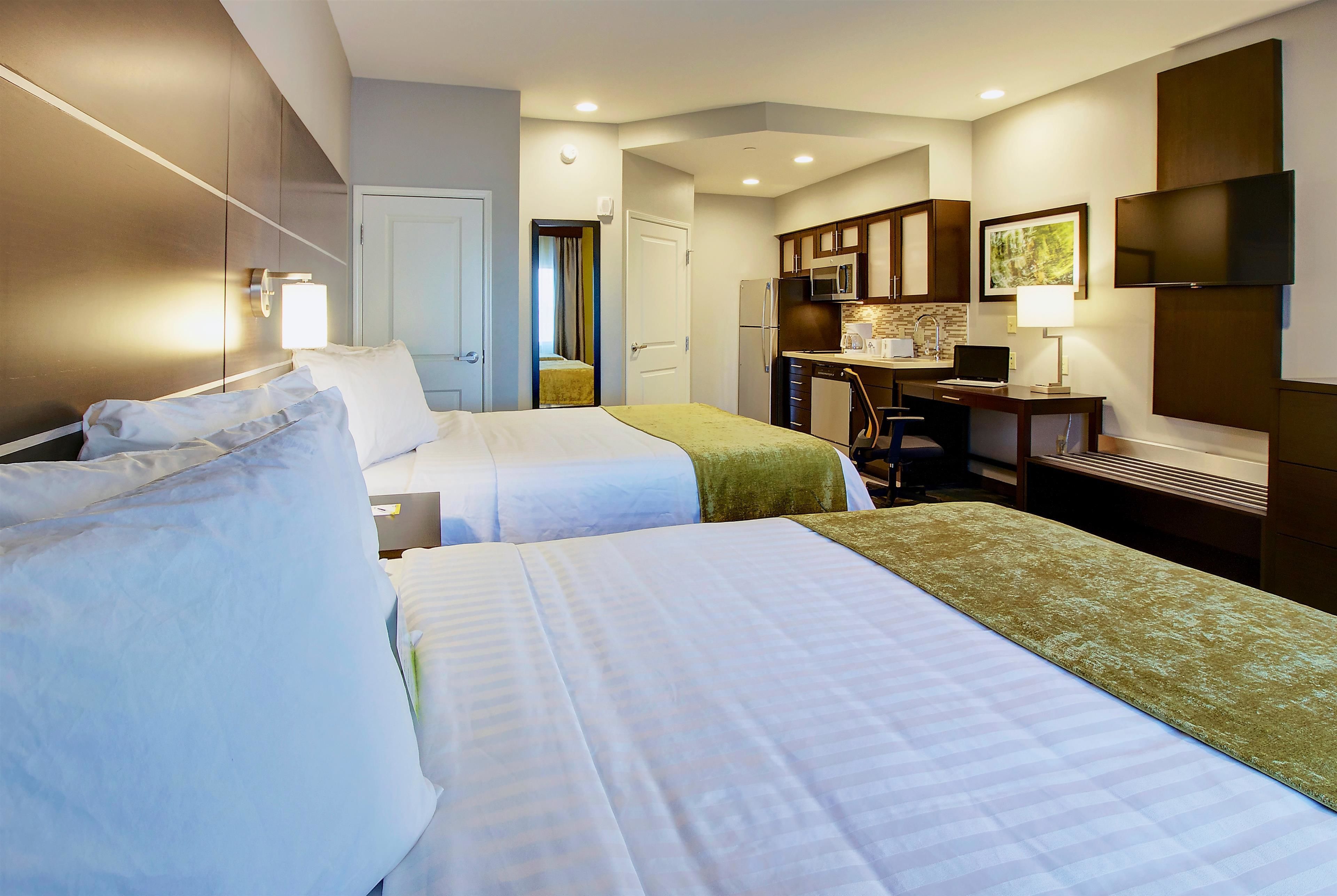 egyptian cotton sheets, down duvets, pillow-top beds, desk