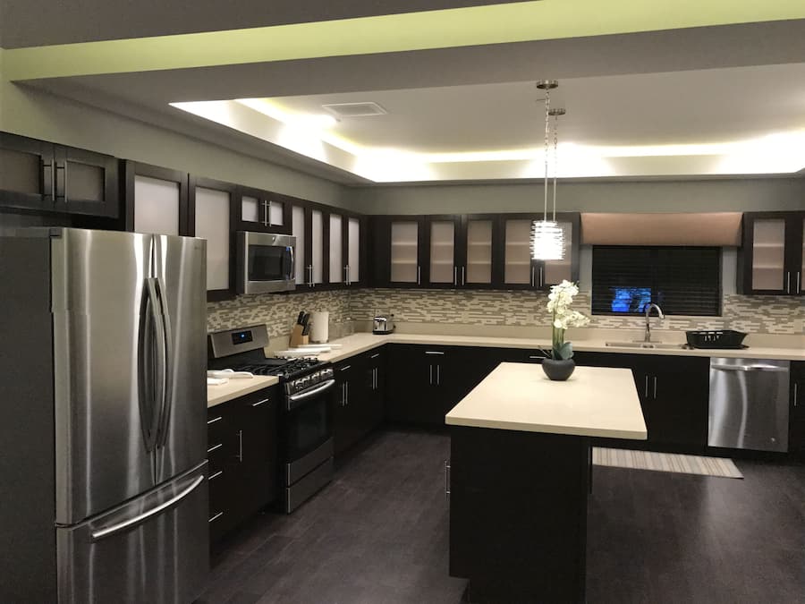 Suite, Non Smoking (Three Bedroom) | Private kitchen | Full-size fridge, microwave, stovetop, dishwasher