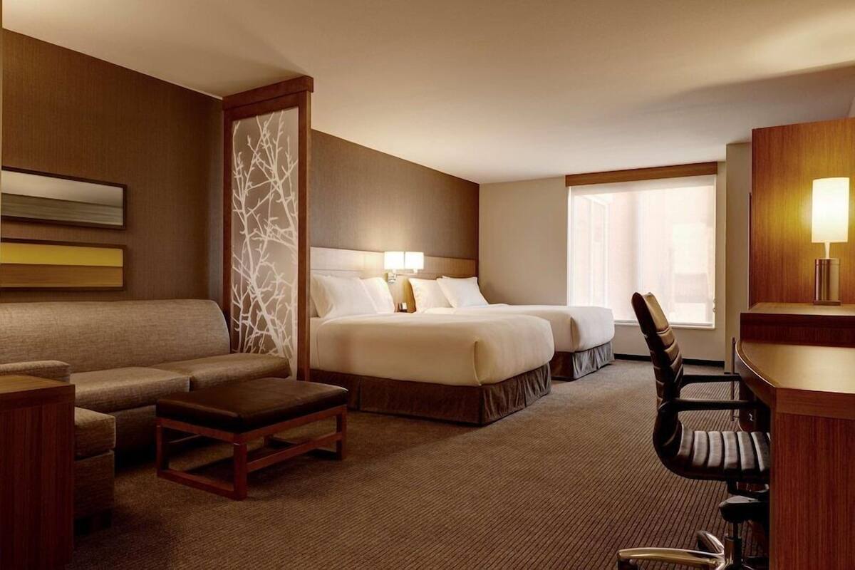 Down comforters, pillowtop beds, desk, laptop workspace