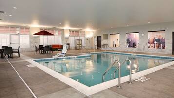 Indoor pool, open 7:00 AM to 10:00 PM, pool loungers
