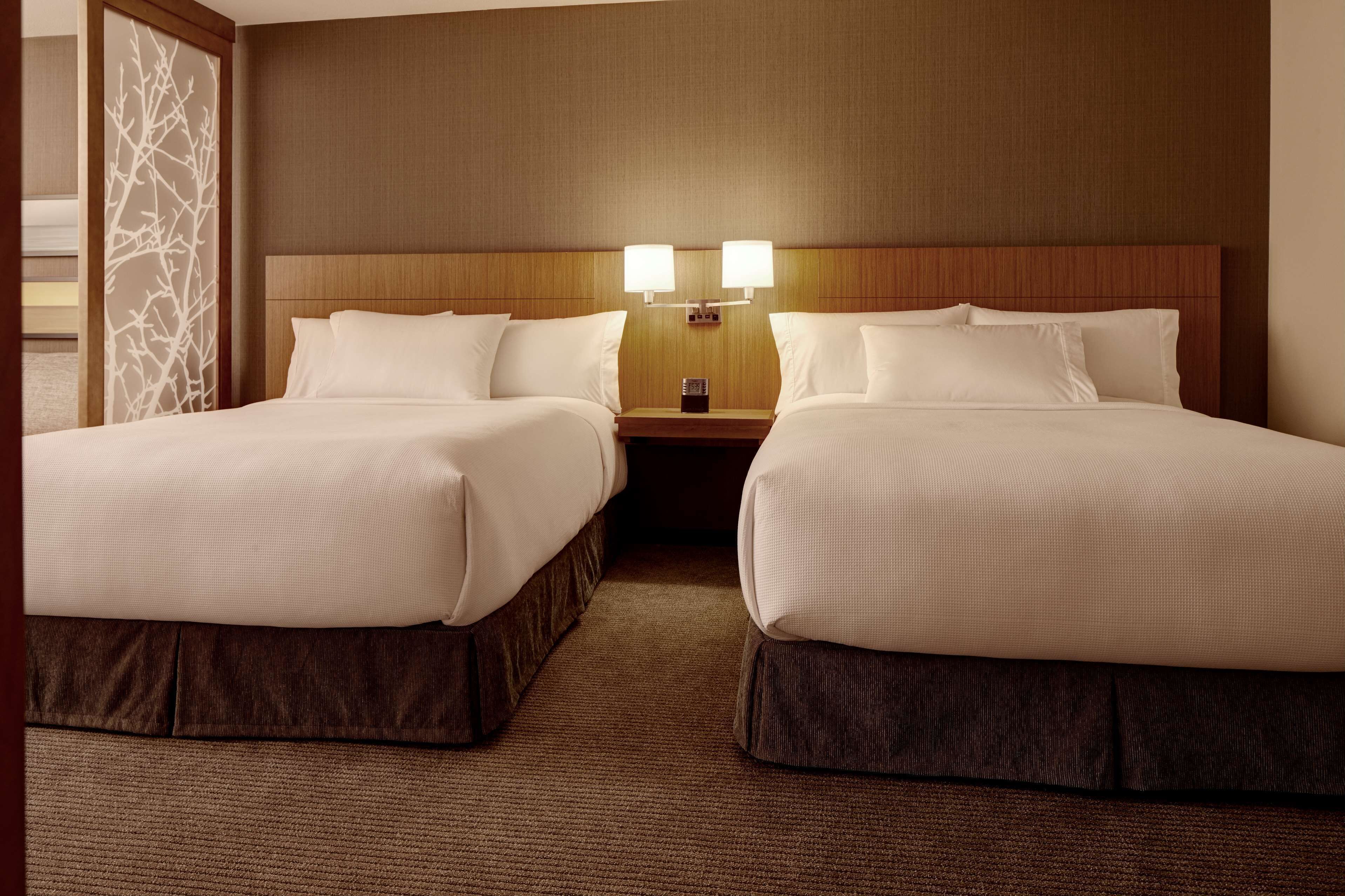 down duvets, pillow-top beds, desk, laptop workspace