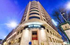 The exterior of the NYX Hotel with a clear view of its entrance and the surrounding urban environment. - NYX Hotel Milan by Leonardo Hotels (Milan)