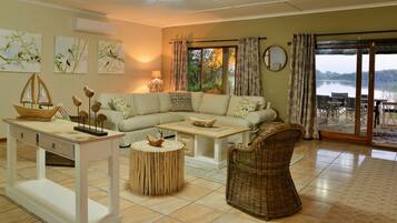 Exclusive-Haus, 1 Queen-Bett, Flussblick, zum Garten hin | Wohnbereich