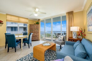 Condo, 1 Bedroom, 2 Bathrooms, Sea View (Pelican 601) | Living area | Flat-screen TV, DVD player