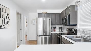 Condo, 2 Bedrooms, Resort View (314) | Private kitchen | Fridge, microwave, oven, stovetop