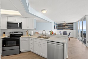 Condo, 2 Bedrooms, Ocean View (204E) | Private kitchen | Fridge, microwave, oven, stovetop - Aquavista Beach Resort By Panhandle Getaways (Panama City Beach)
