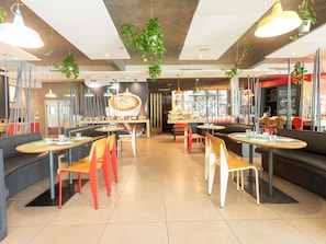 Lunch, dinner served; international cuisine, al fresco dining