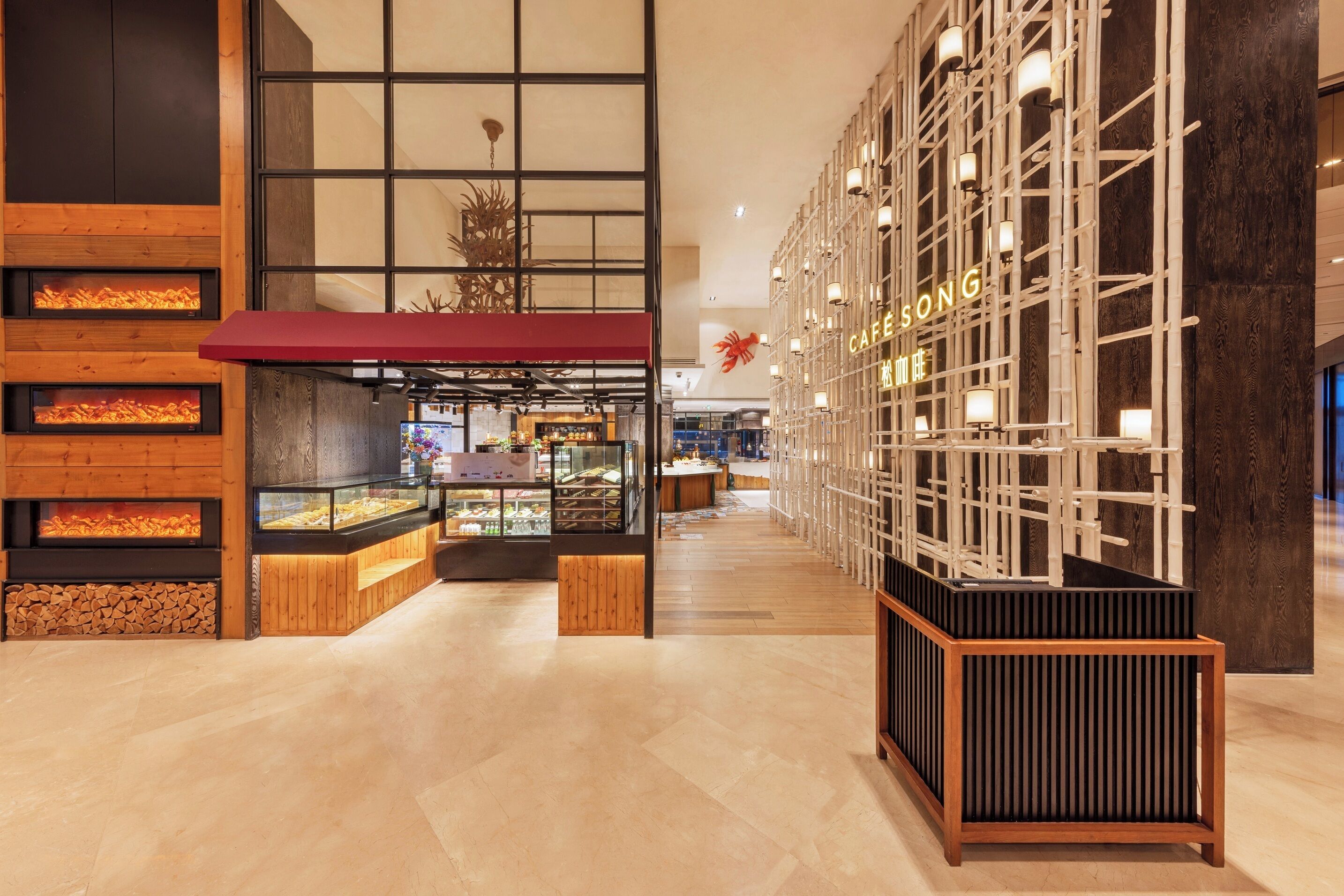 A modern interior with a wooden display case, a red awning, and a wall-mounted sign reading "CAFE SONG".