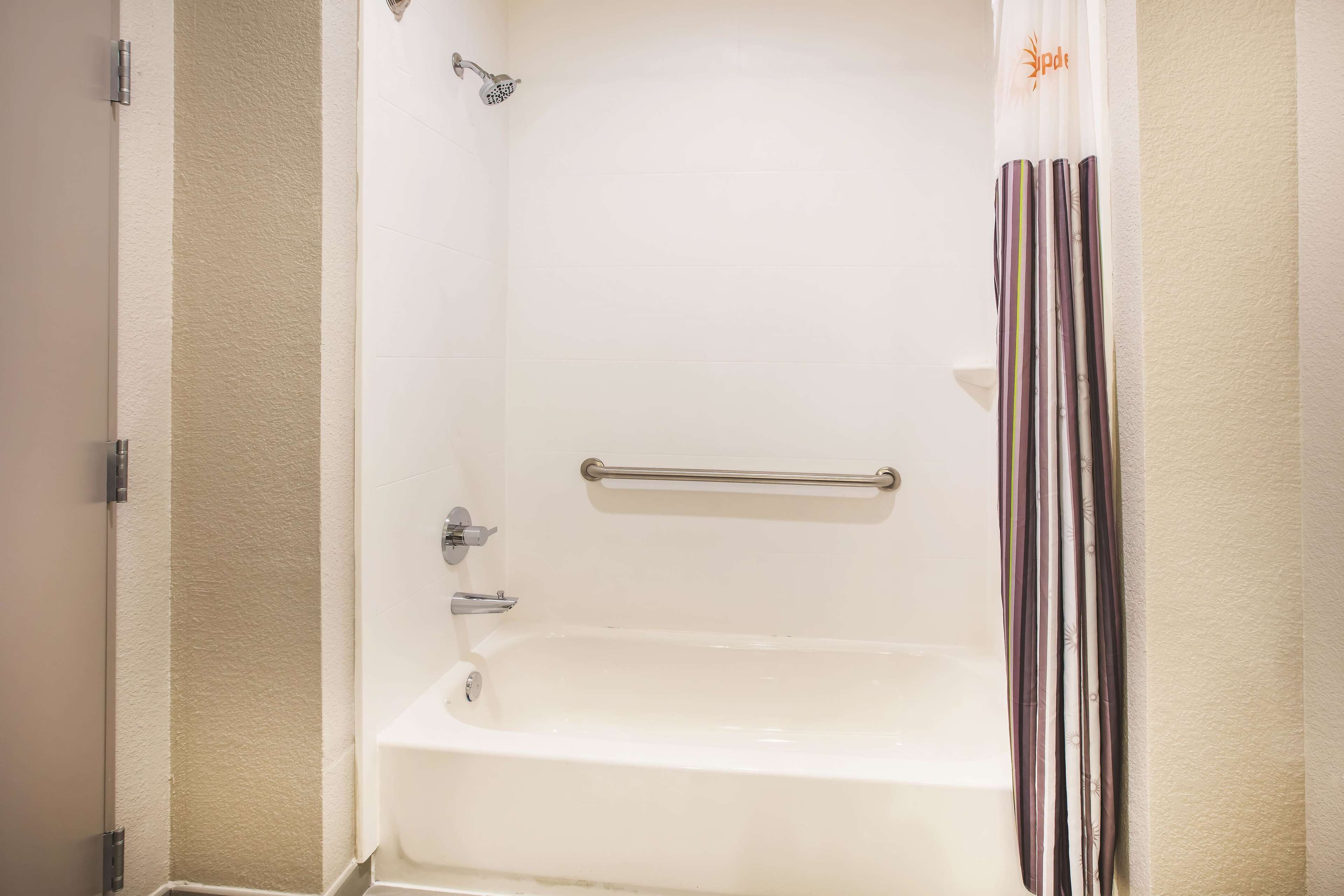 premium bedding, pillow-top beds, desk, laptop workspace