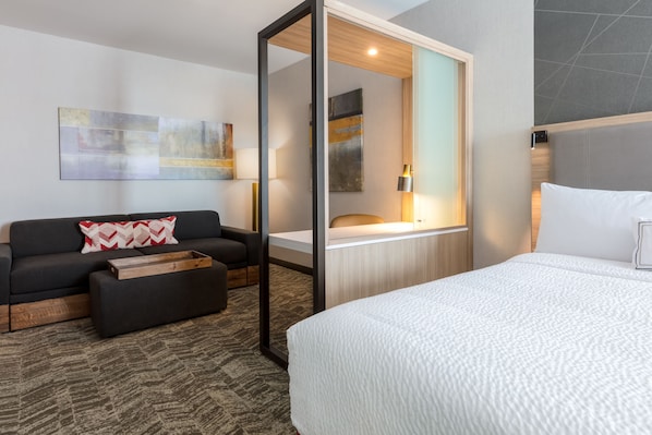 Suite, Multiple Beds | Living room | 43-inch LED TV with satellite channels, TV, Netflix