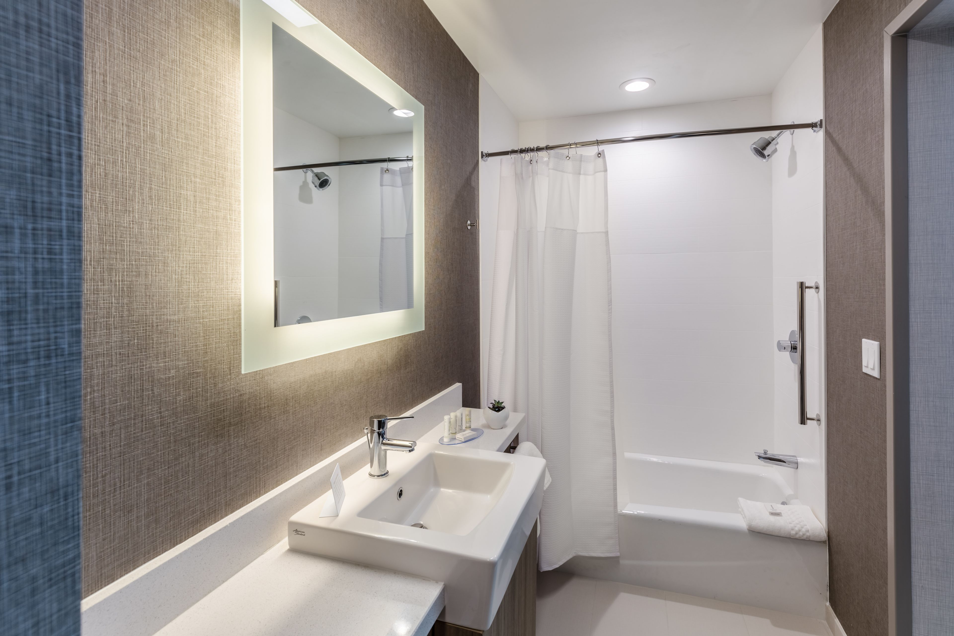 suite, multiple beds | bathroom | deep-soaking bathtub, free toiletries, hair dryer, towels