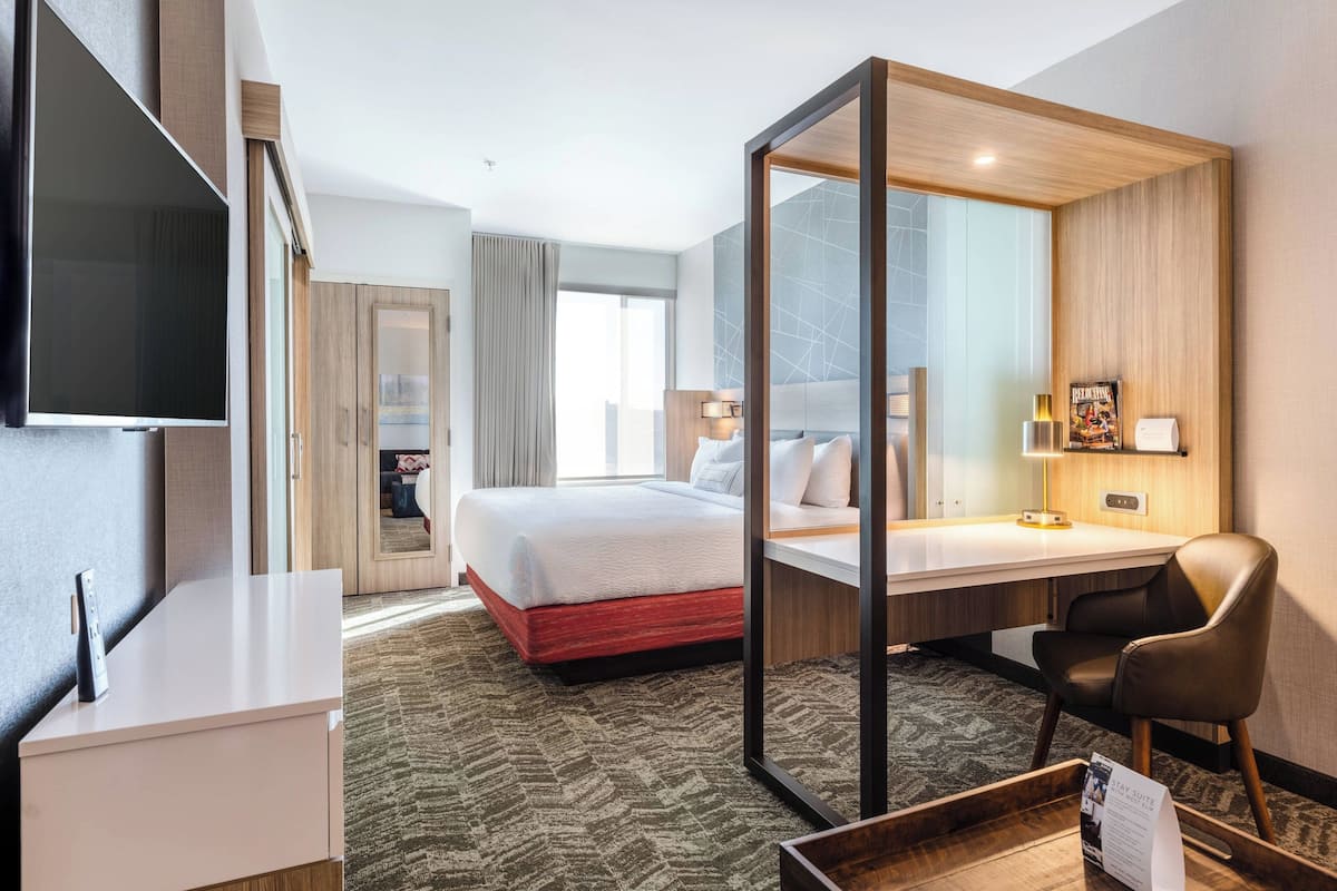 suite, 1 king bed with sofa bed | desk, blackout curtains, iron/ironing board, free cots/infant beds