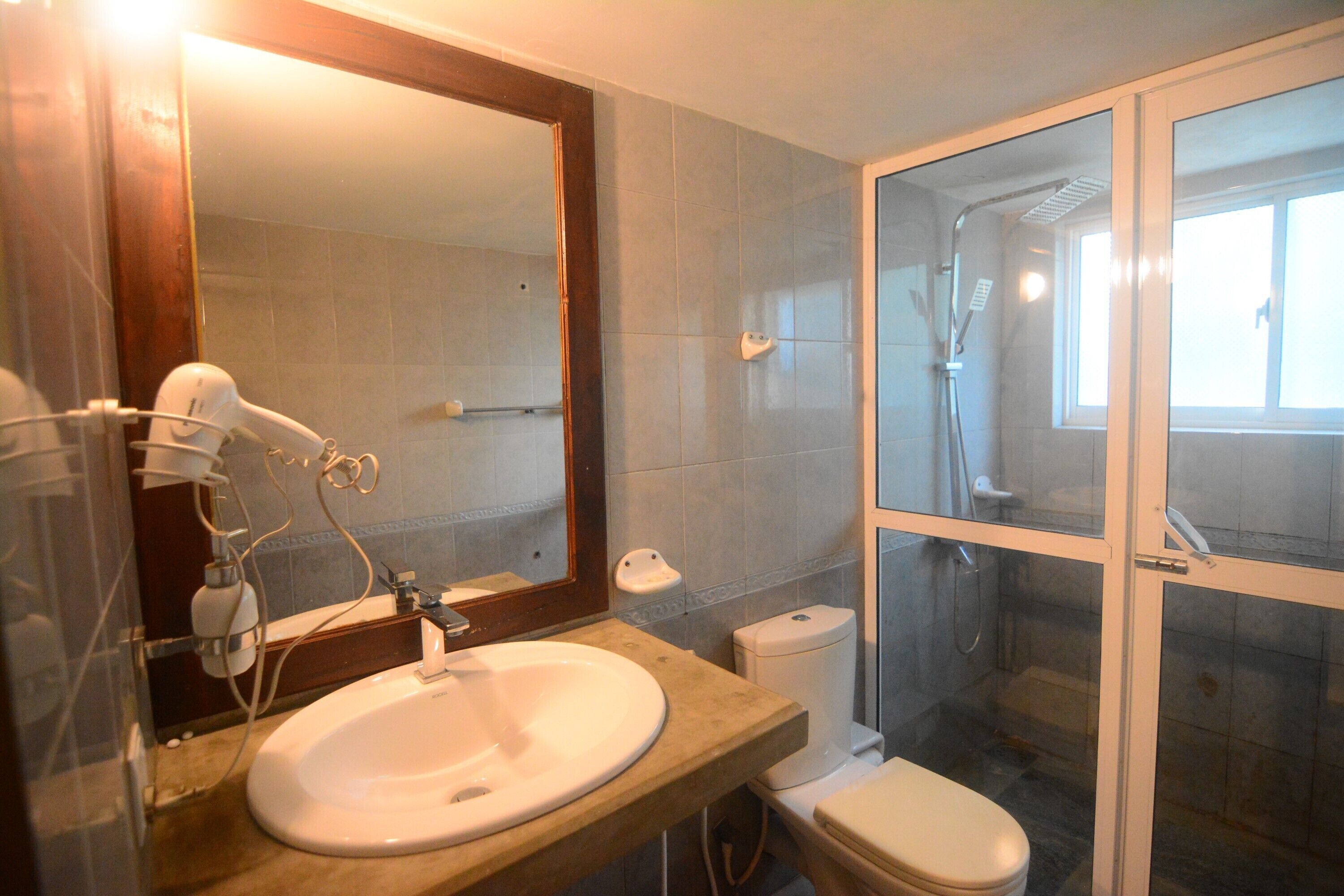 deluxe triple room | bathroom | shower, rainfall showerhead, designer toiletries, hair dryer