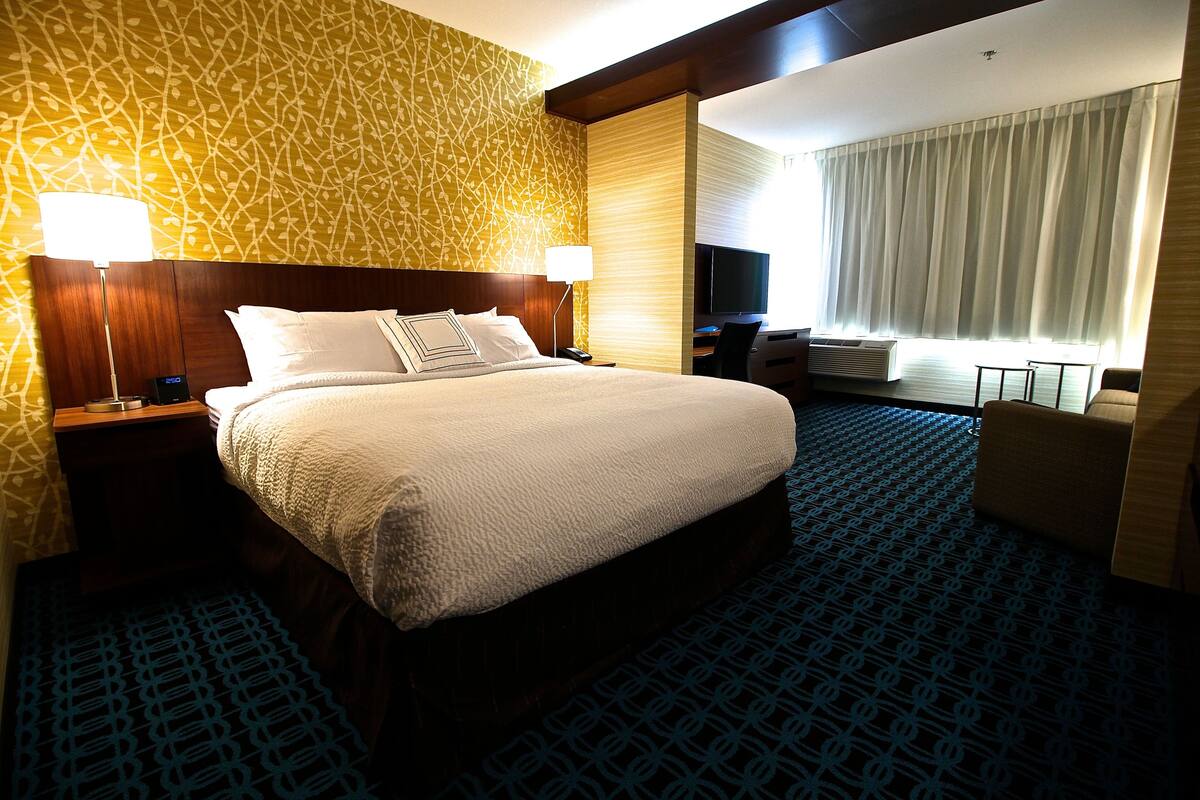 suite, 1 king bed with sofa bed | pillow-top beds, desk, blackout curtains, iron/ironing board