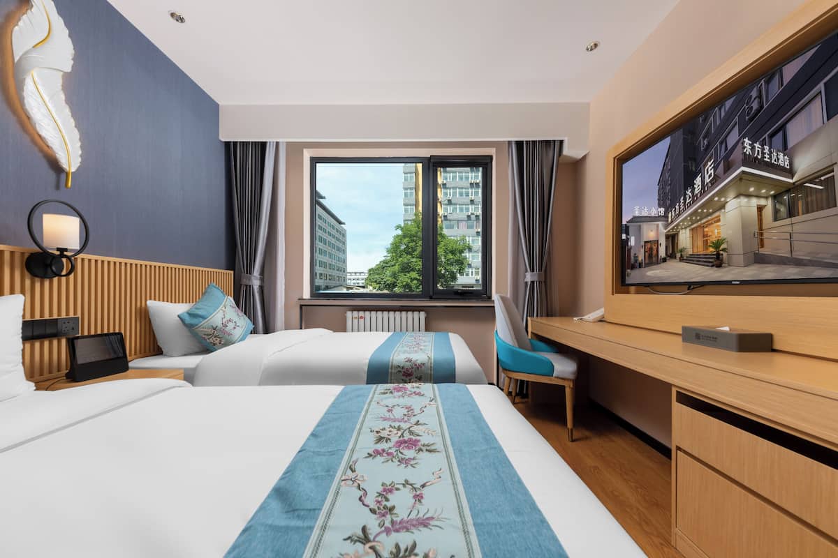 City Twin Room | Memory foam beds, desk, blackout drapes, soundproofing