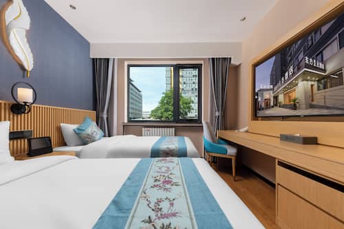 City Twin Room | Memory-foam beds, desk, blackout curtains, soundproofing