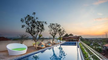 Outdoor pool, open 7:00 AM to 7:00 PM, pool umbrellas, sun loungers