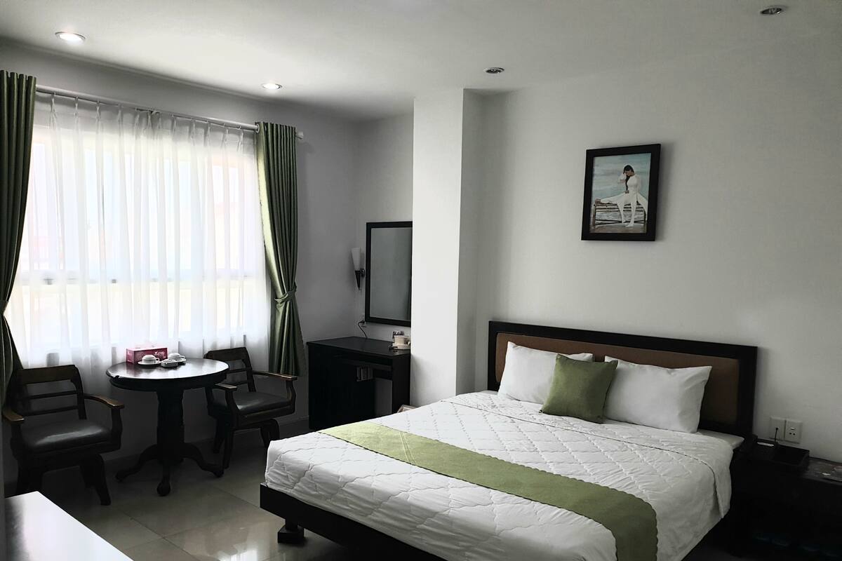 Deluxe Double or Twin Room | Minibar, desk, blackout curtains, free WiFi