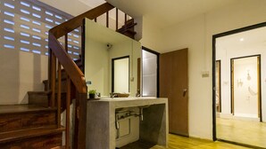 Economy Quadruple Room, Ground Floor | Bathroom | Shower, hair dryer, towels - Z's Hostel at Tha Phae Gate (Chiang Mai)