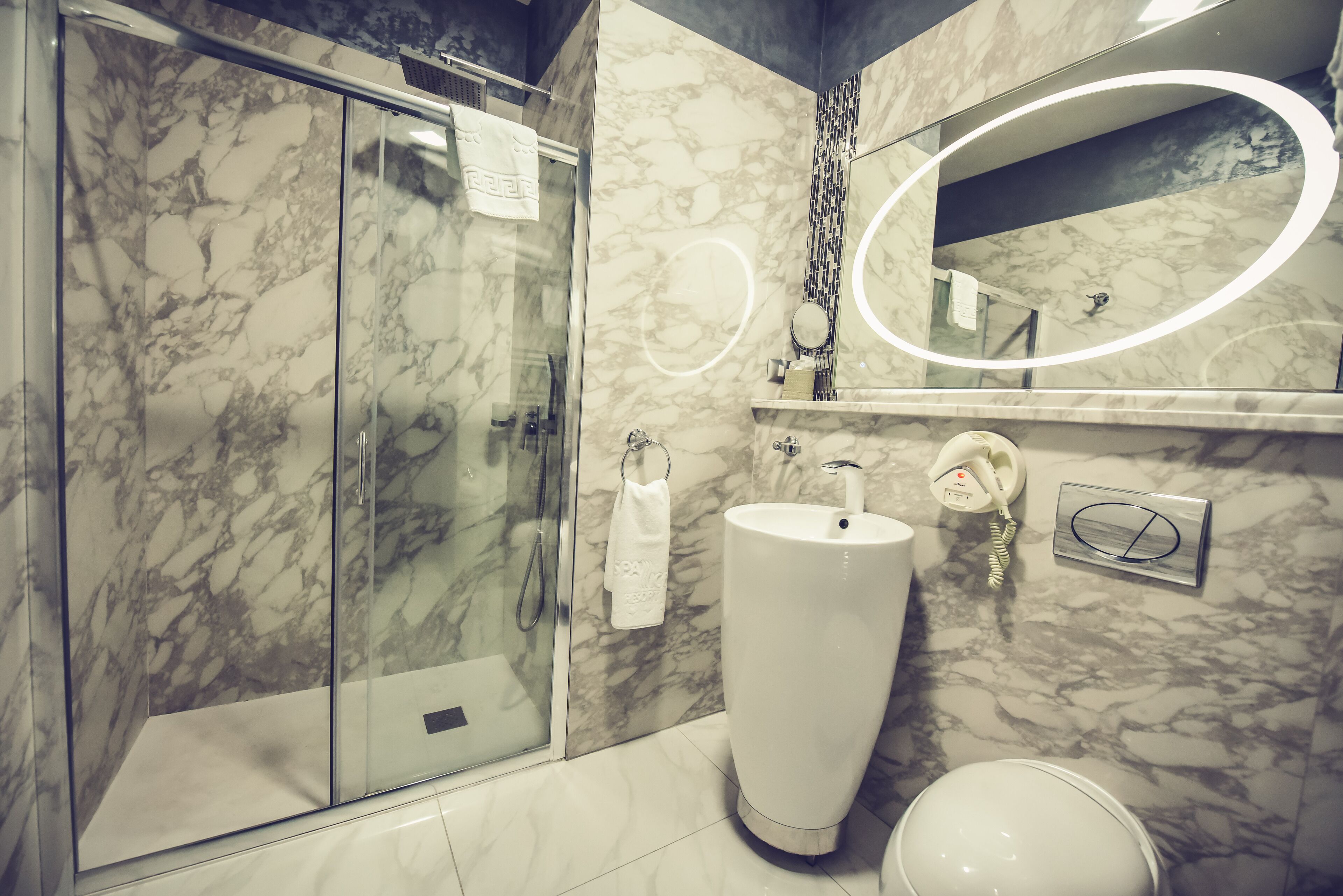 shower, hair dryer, dressing gowns, slippers