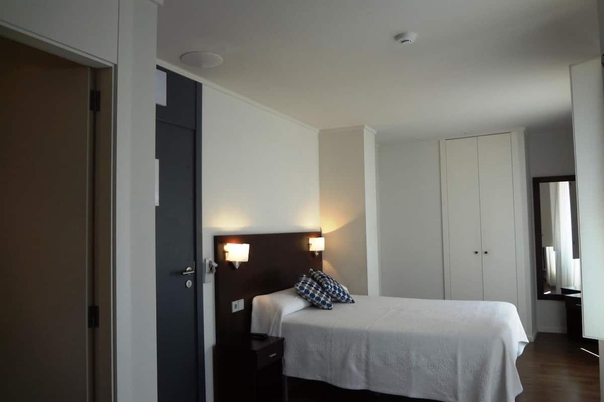 1 bedroom, desk, laptop workspace, iron/ironing board