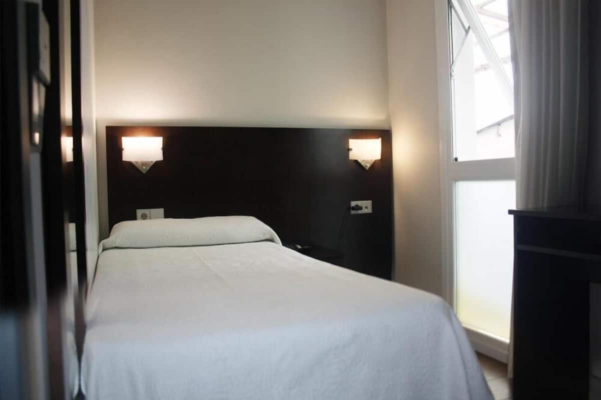 1 bedroom, desk, laptop workspace, iron/ironing board