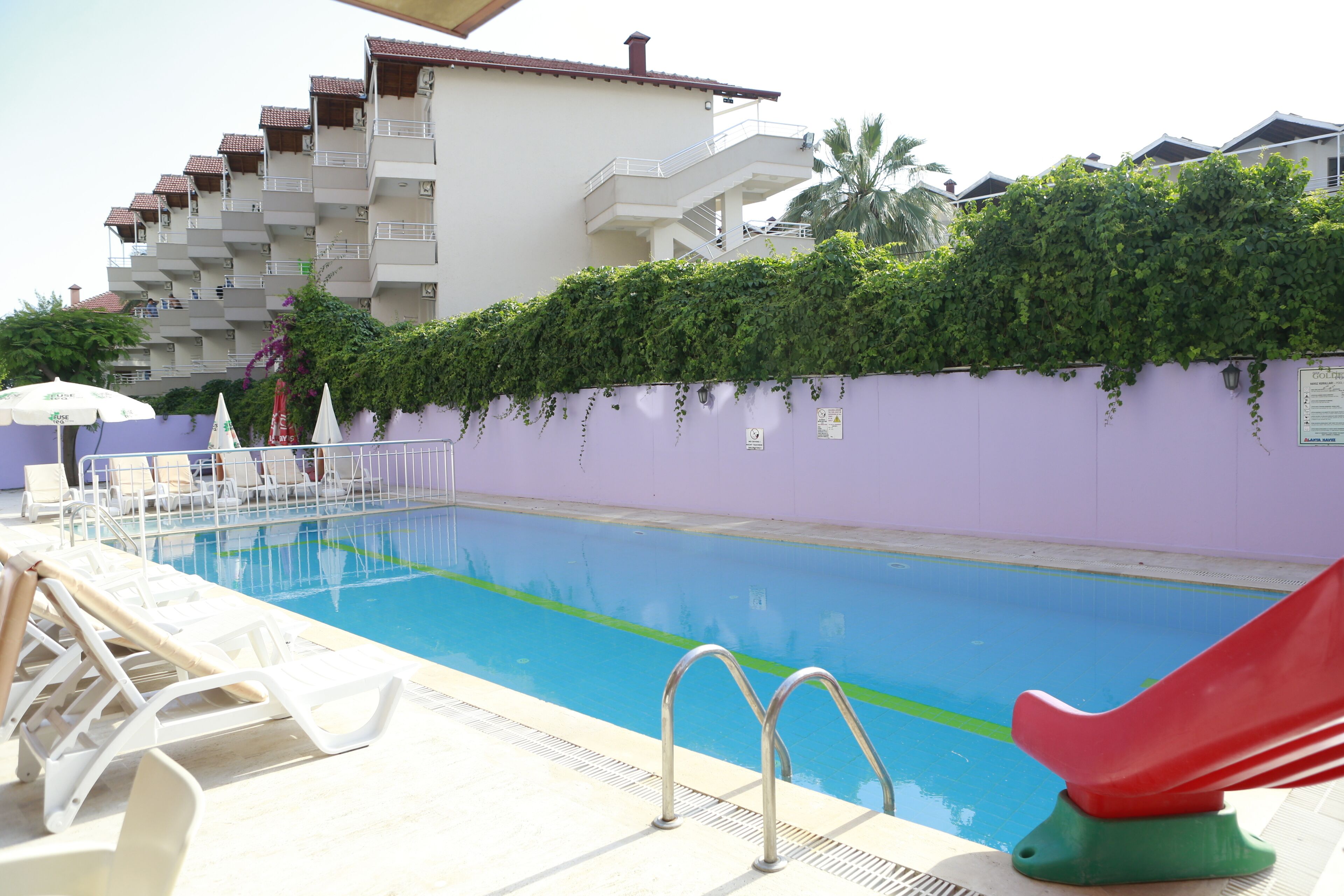Outdoor pool, open 9:00 AM to 6:30 PM, pool umbrellas, sun loungers