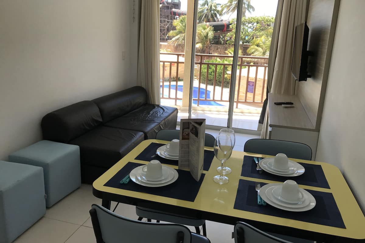Standard Apartment, Pool View | In-room dining