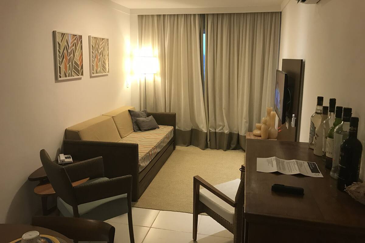 Superior Apartment | Living area | Flat-screen TV