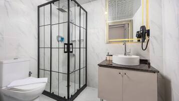 Shower, free toiletries, hair dryer, slippers