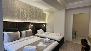 Economy Triple Room | Premium bedding, minibar, in-room safe, soundproofing