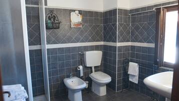 Apartment, 1 Bedroom | Bathroom | Shower, free toiletries, hair dryer, bidet