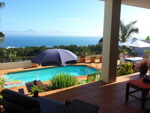 Outdoor pool, pool umbrellas, sun loungers