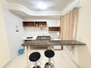 Apartamento | Cozinha privada | Micro-ondas